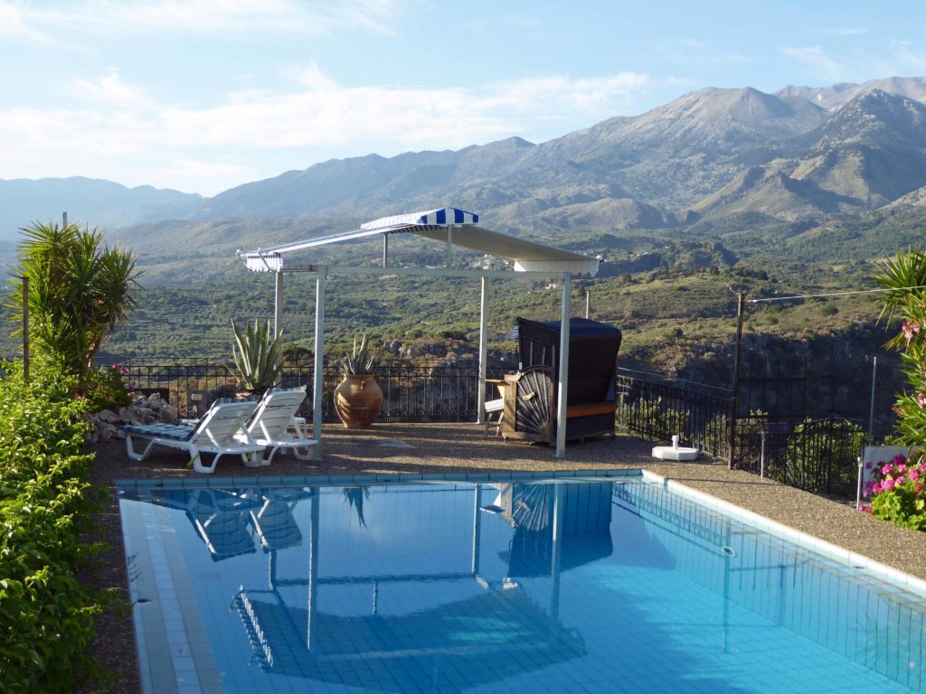 Recharge your batteries at Panokosmos, lounge by the pool with great views of the mountains